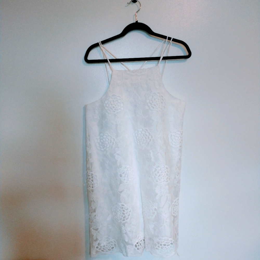 NWT white lace dress with crossed straps. Charlotte Russe size medium
